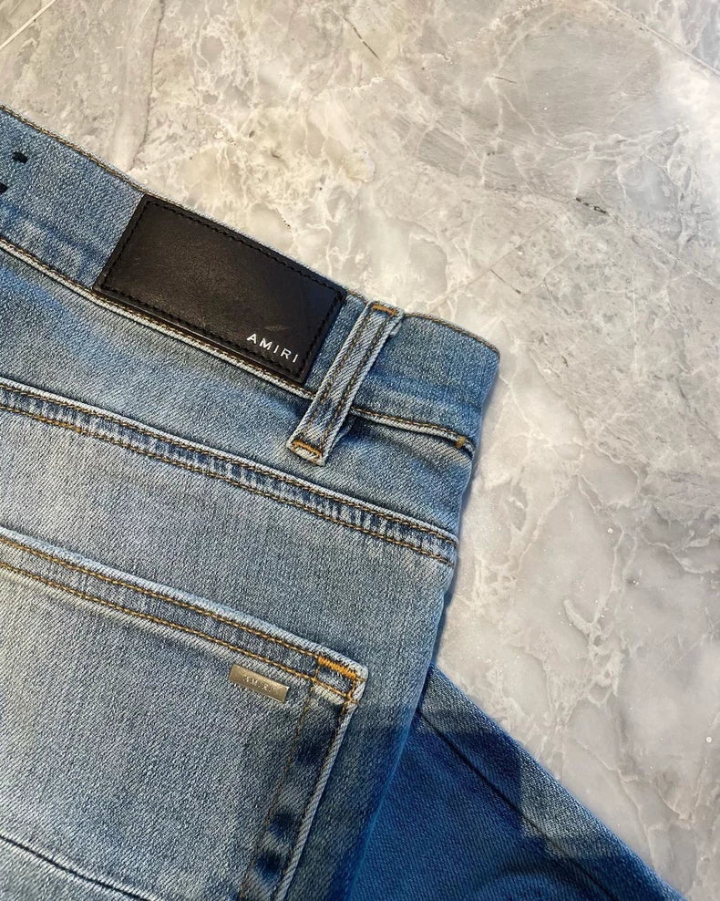 Amiri Thrash MX1 Watercolor Denim Pants