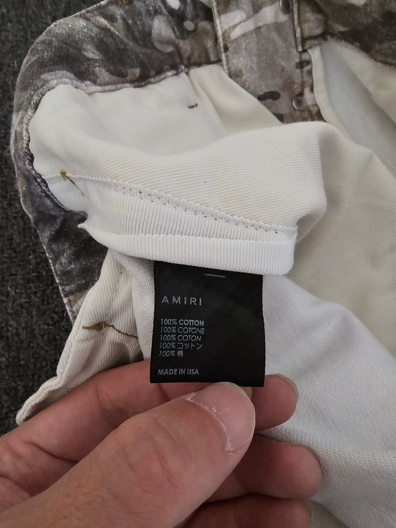 Amiri Washed Camo Wide-Leg Jeans-yf