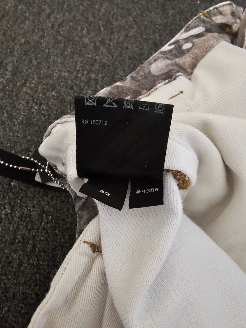 Amiri Washed Camo Wide-Leg Jeans-yf