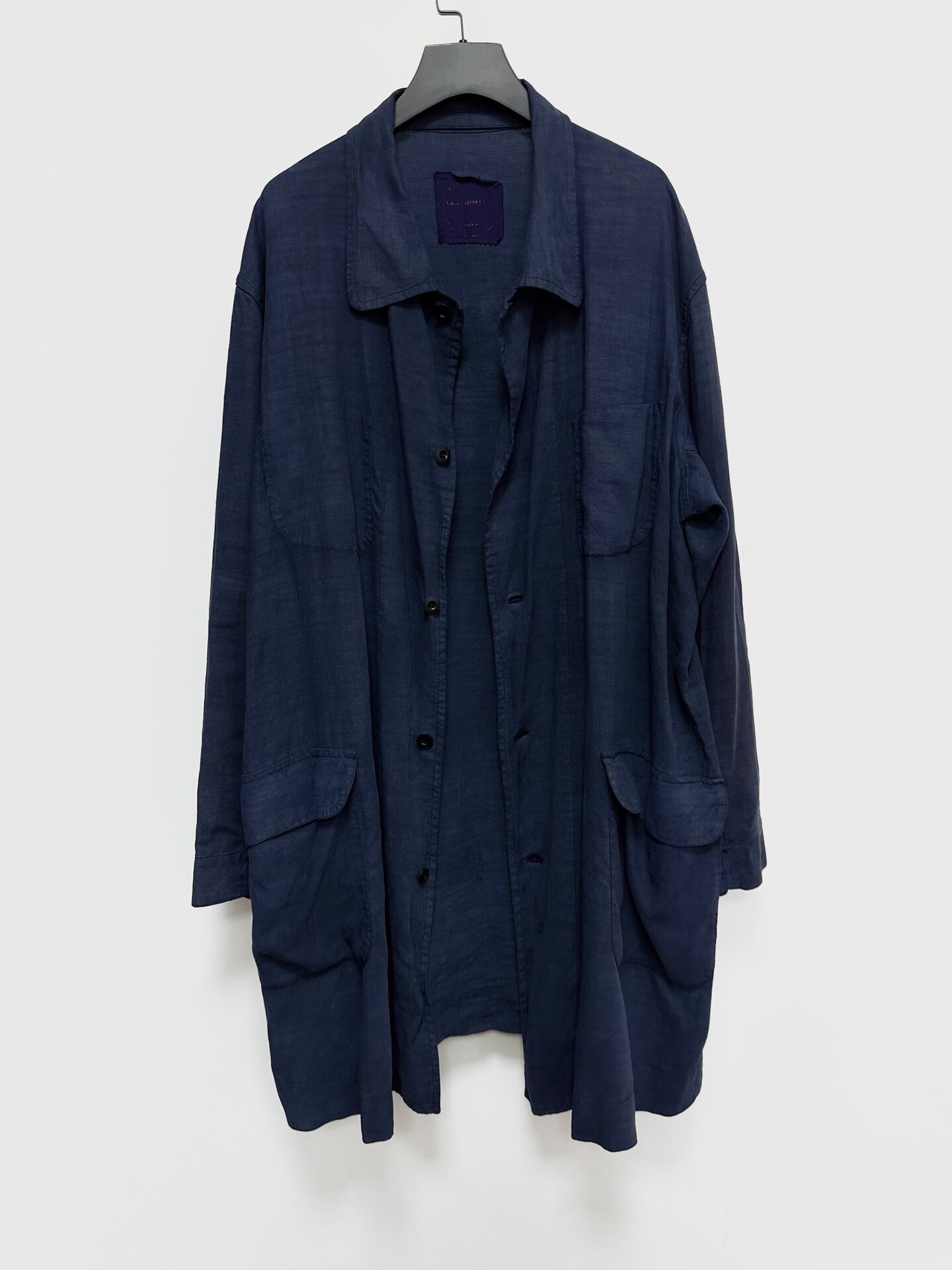 blue dyed linen coat by VIDALENC