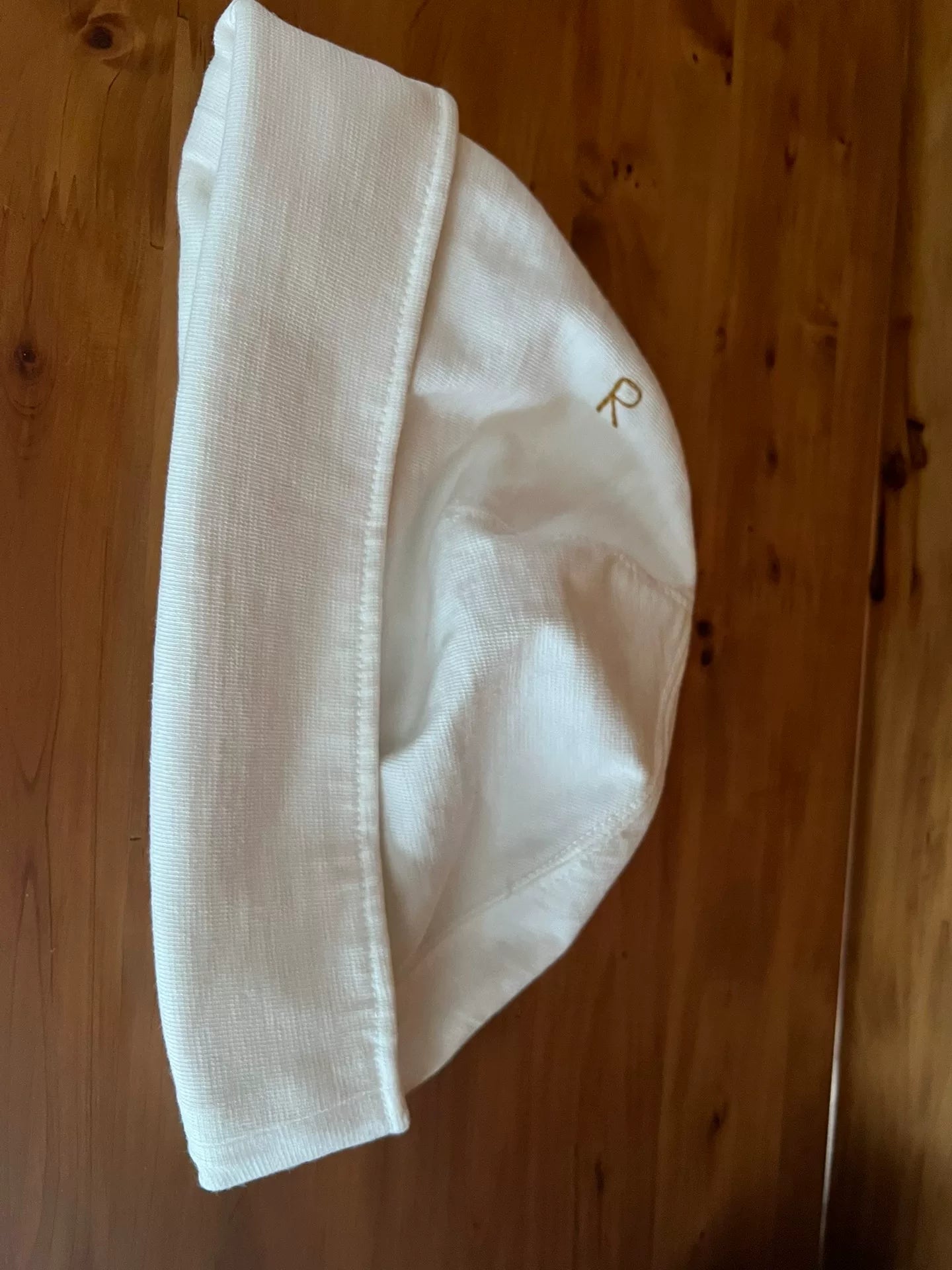 white knitted beanie with logo