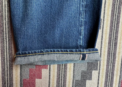 fdmtl slim fit denim with repair patches