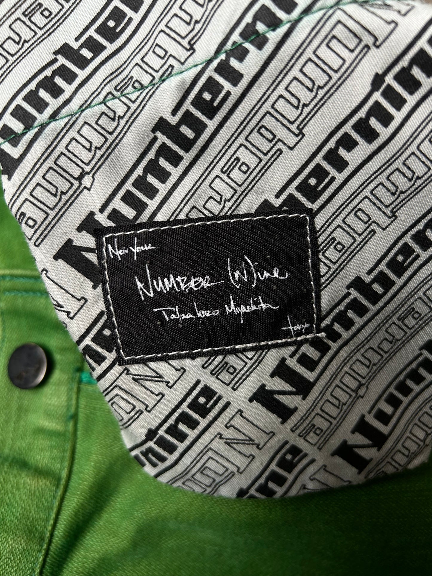 green embroidered denim pants by number(n)ine