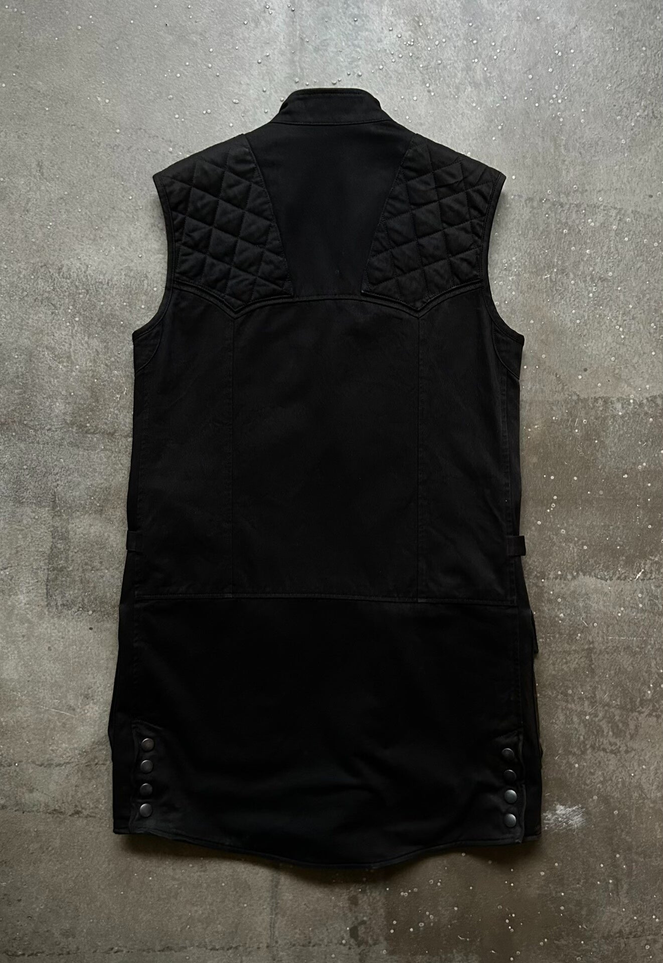 black motorcycle vest with quilted design