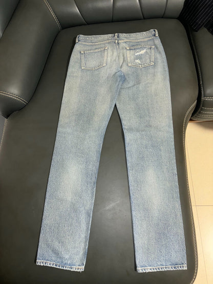 Saint Laurent Distressed Knee Denim Pants