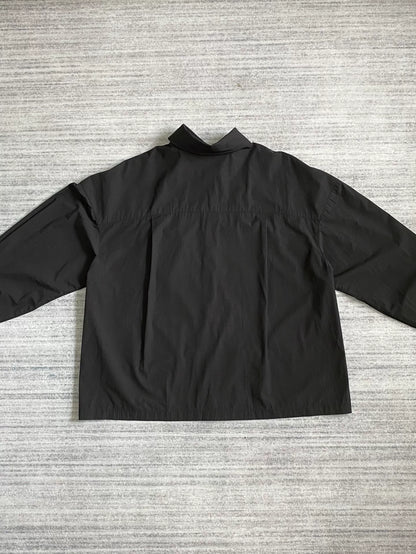 black pocket shirt with hidden buttons