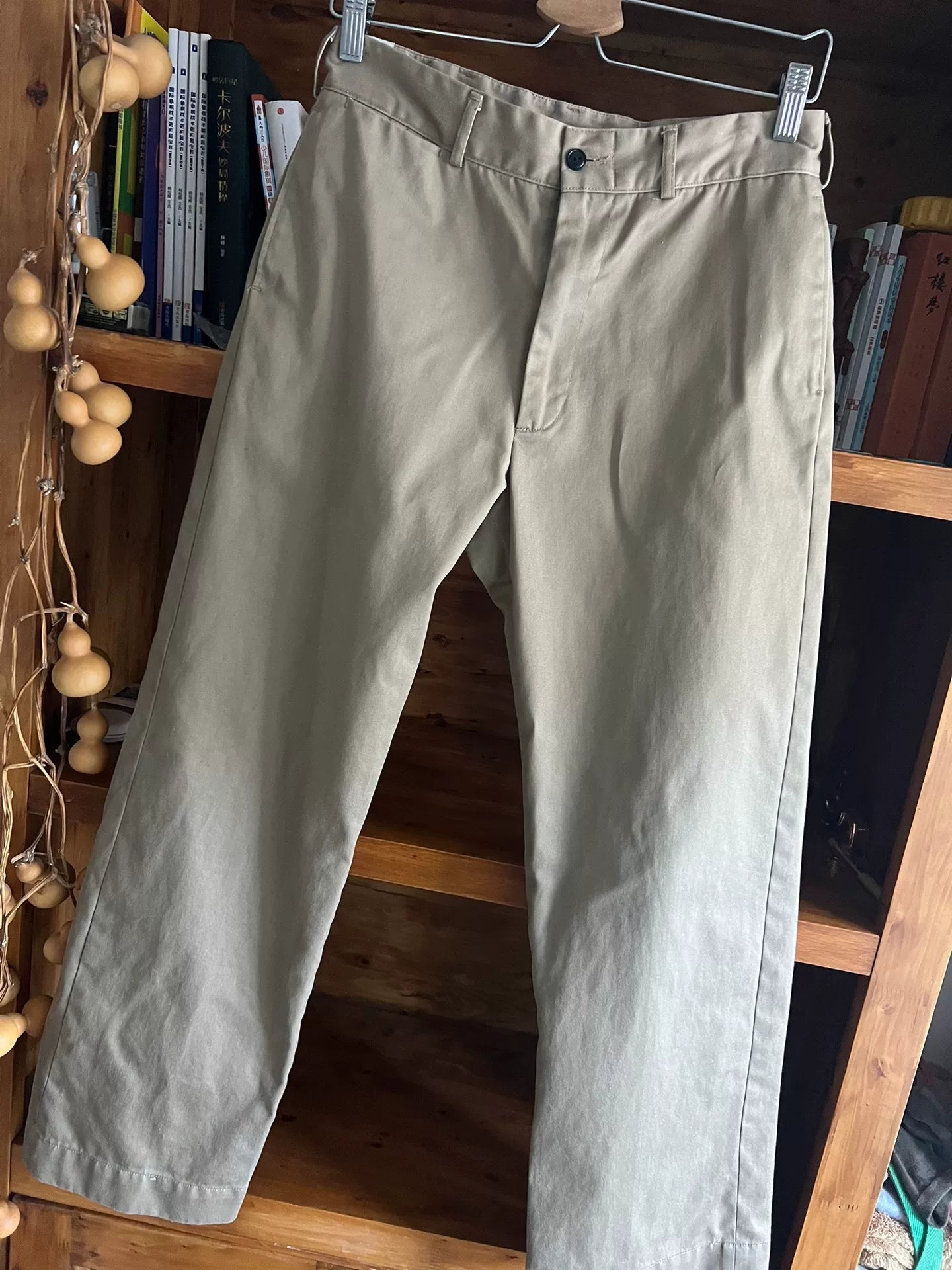 khaki pants with custom zipper details