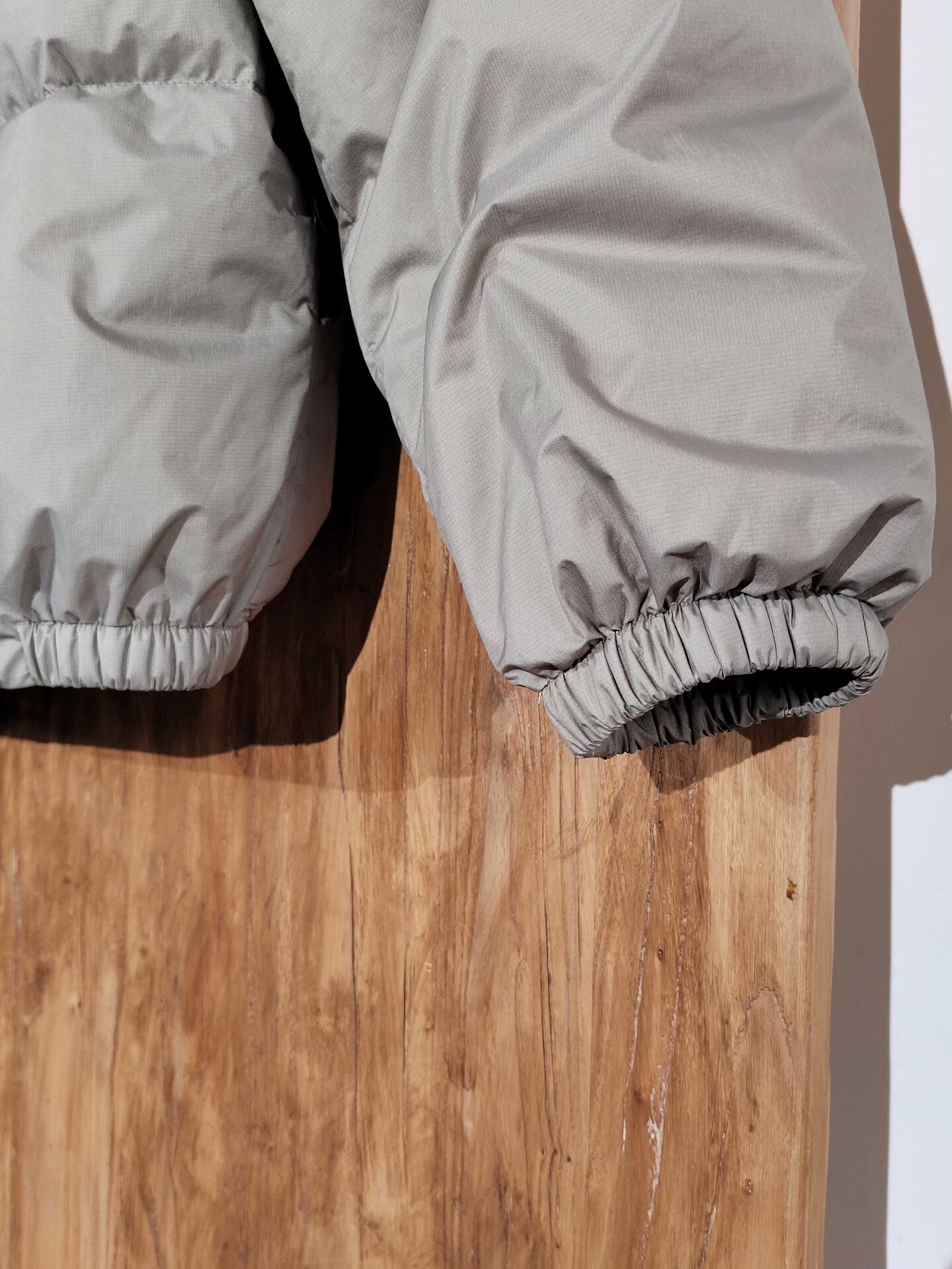 Prada Down Jacket in Gray Color