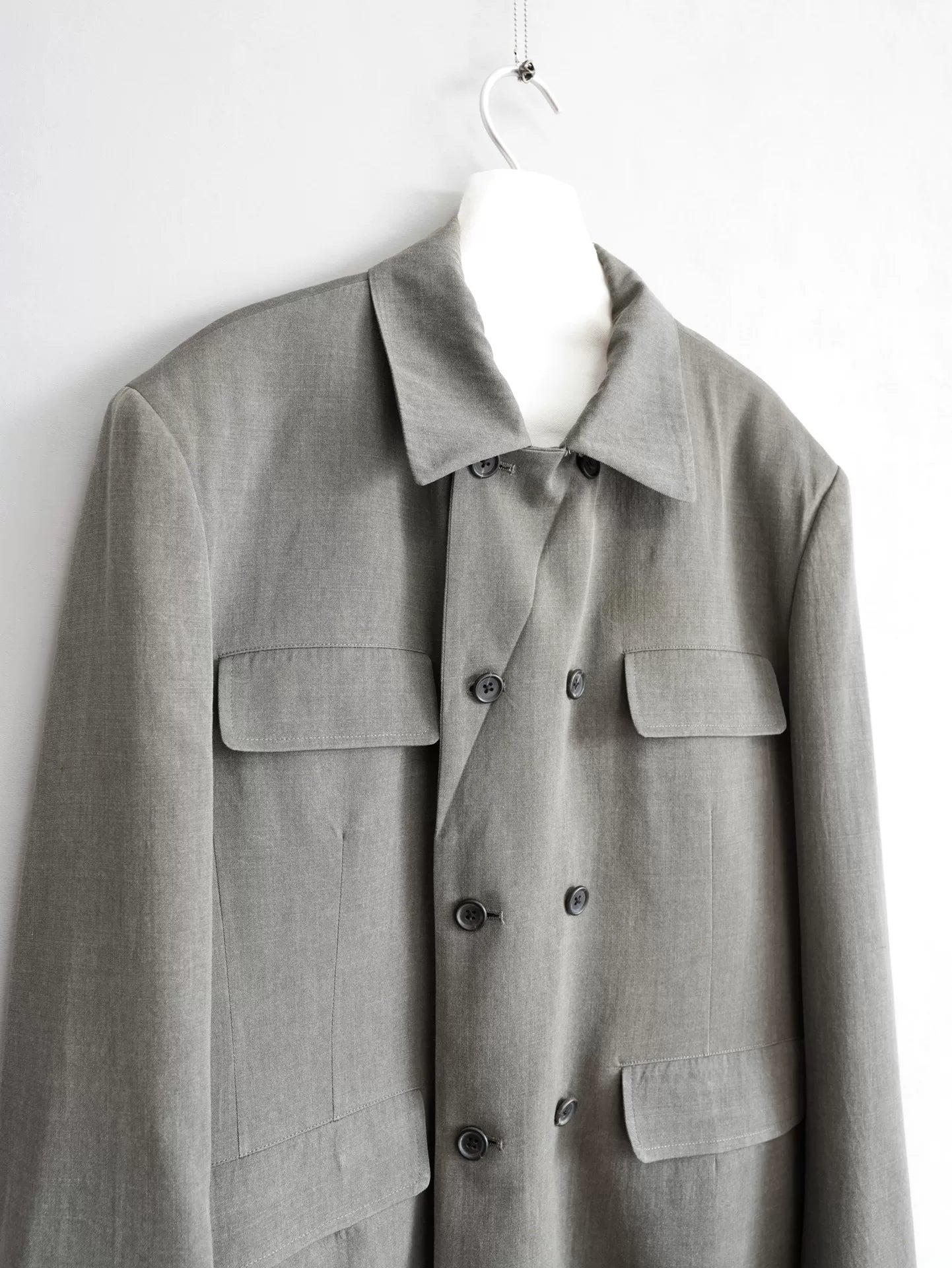 double-breasted concrete gray jacket