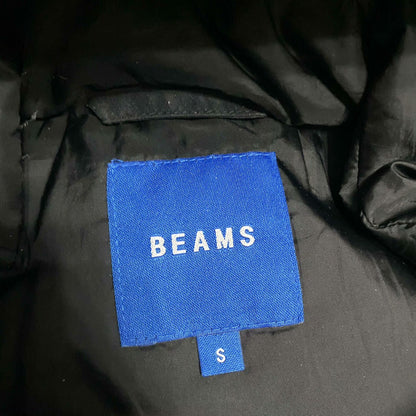 black waterproof puffer jacket by BEAMS