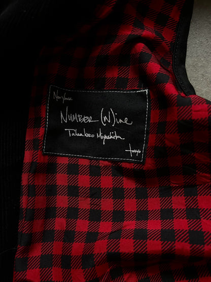 black motorcycle vest with quilted design