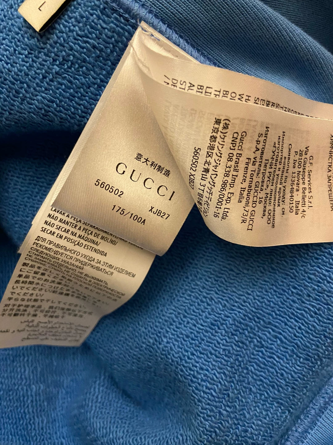 gucci blue hoodie with logo and stars