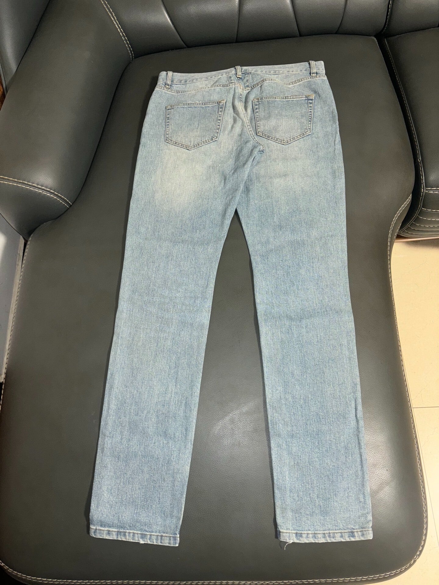 saint laurent ripped knee denim pants