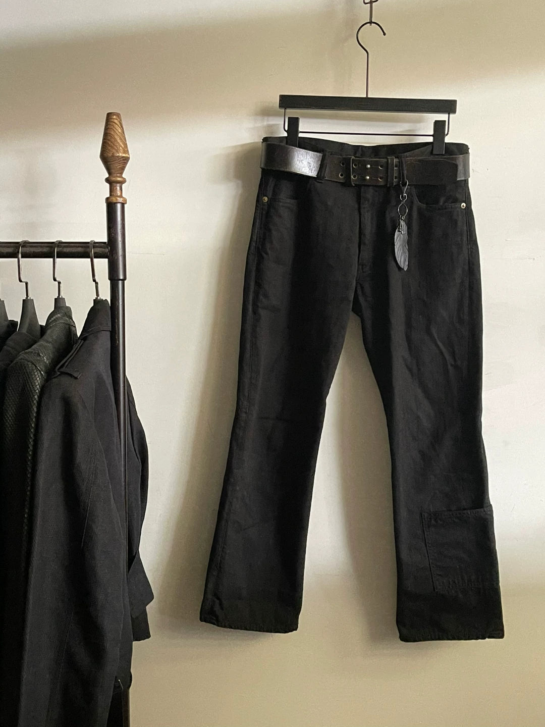 black denim pants with pocket detail