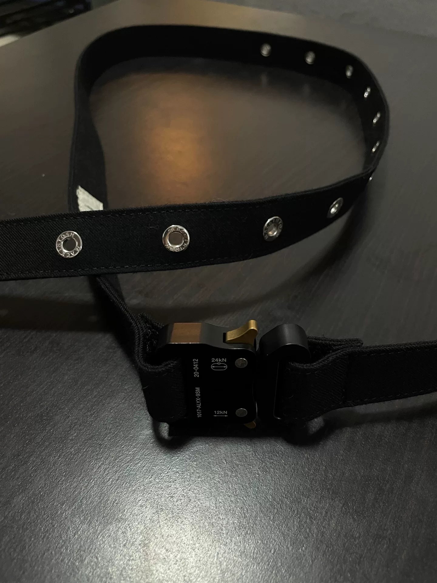 black long belt with studs and buckle