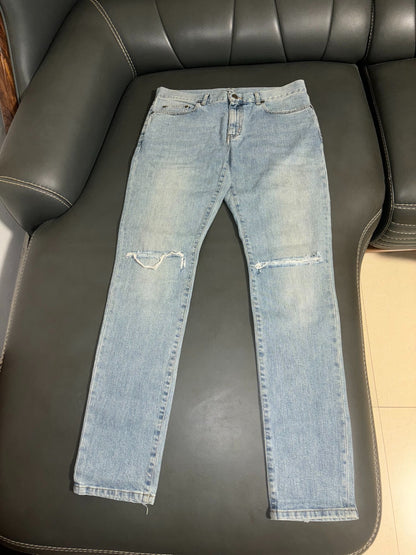 saint laurent ripped knee denim pants