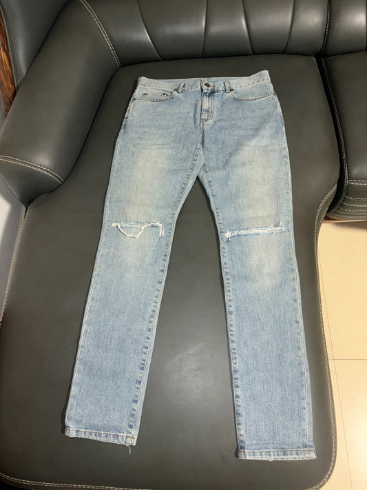 saint laurent ripped knee denim pants