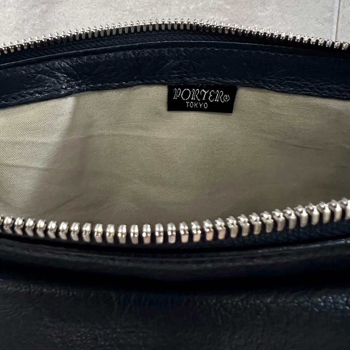 porter rambler leather shoulder bag with logo