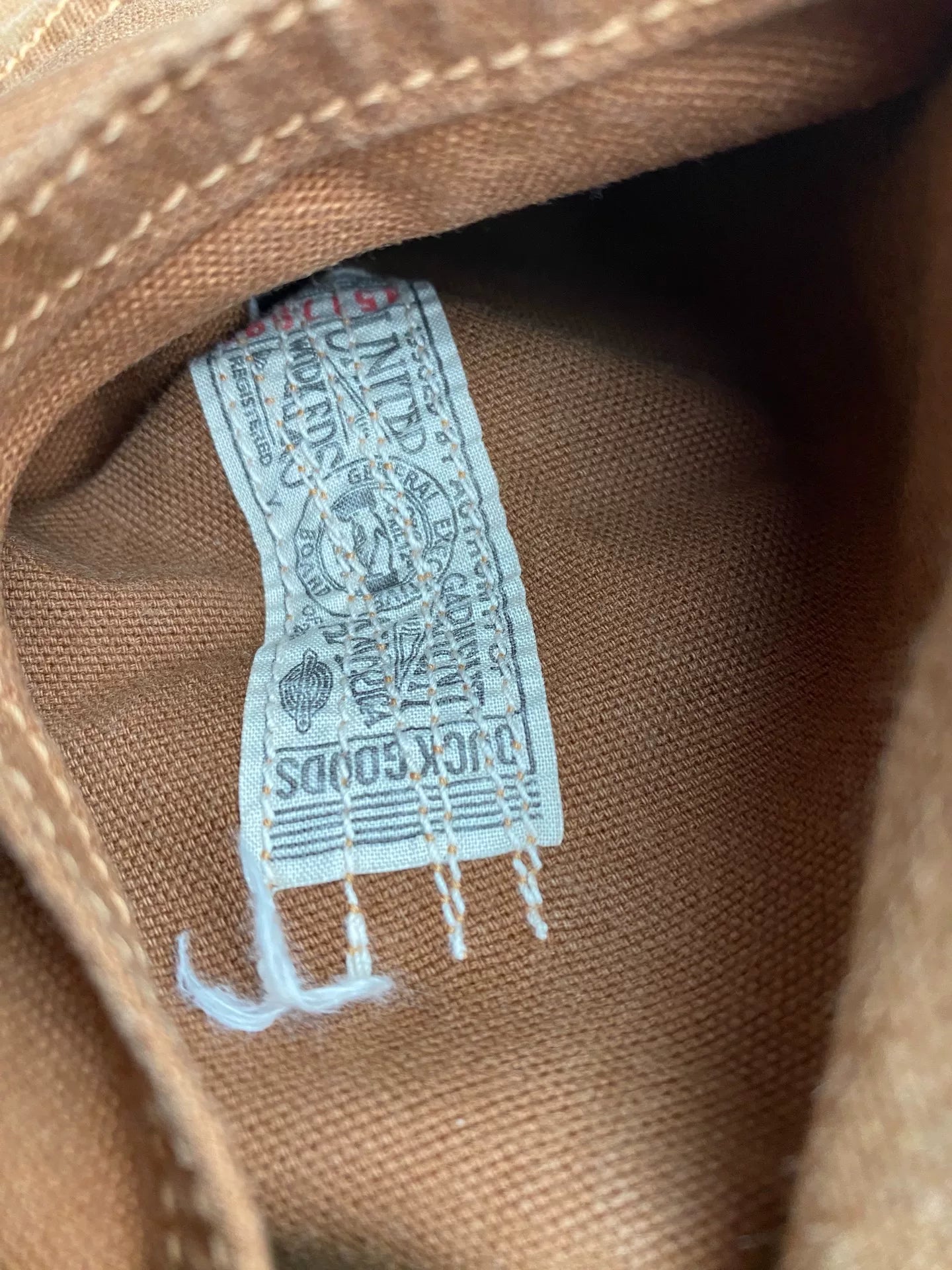 brown patched work pants derrickman