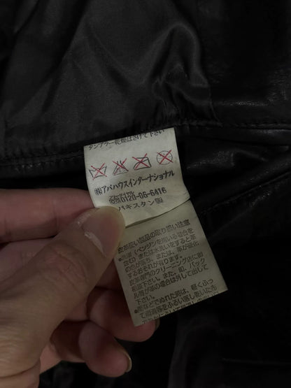 black leather suit coat with vampire style