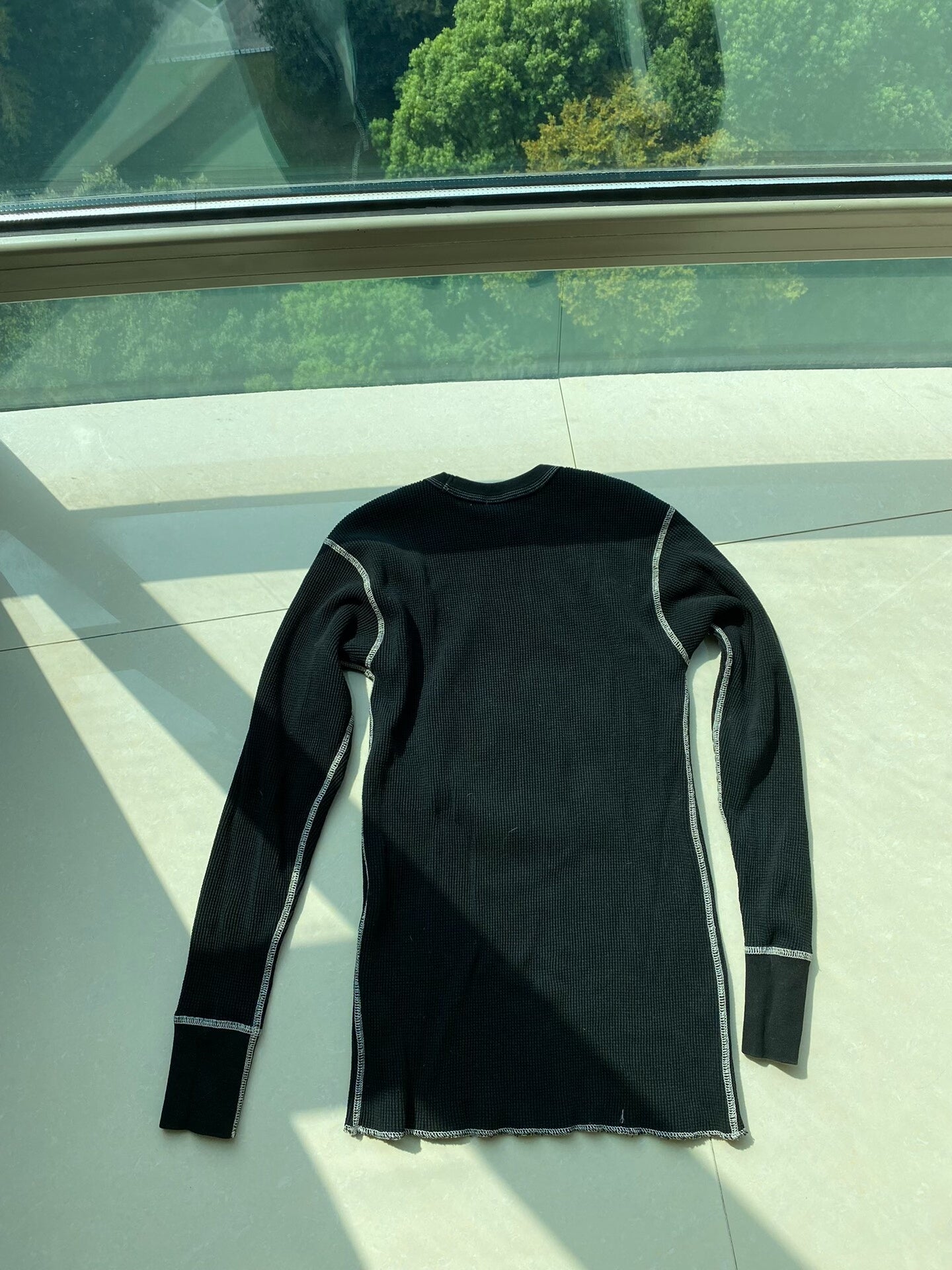 black long sleeve skeleton graphic shirt