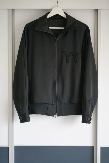 black zip jacket with embroidery details