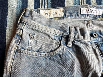 fdmtl slim fit denim distressed patchwork jeans