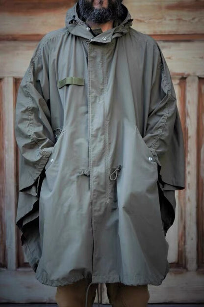 tactical raincoat for outdoor adventure in green