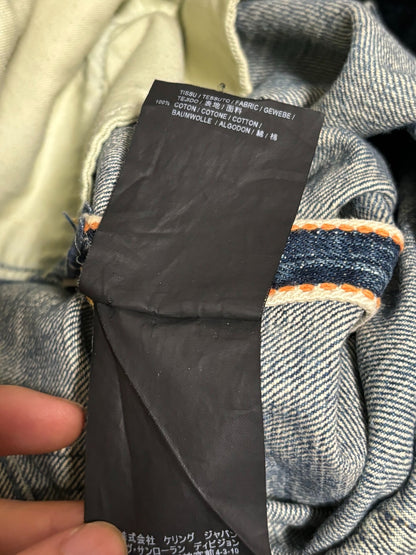 Saint Laurent Distressed Denim Jeans in Blue