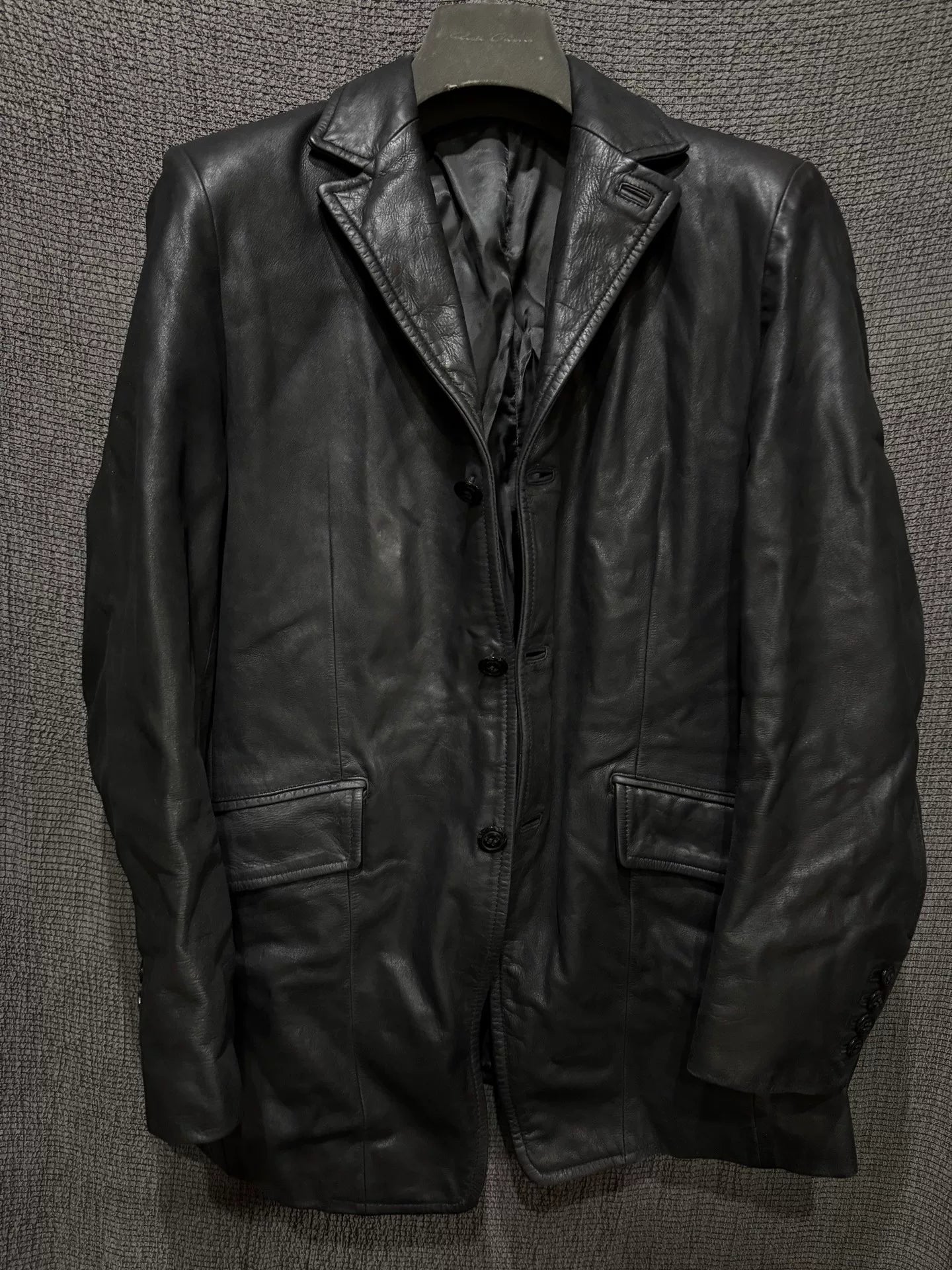 black leather suit coat with vampire style