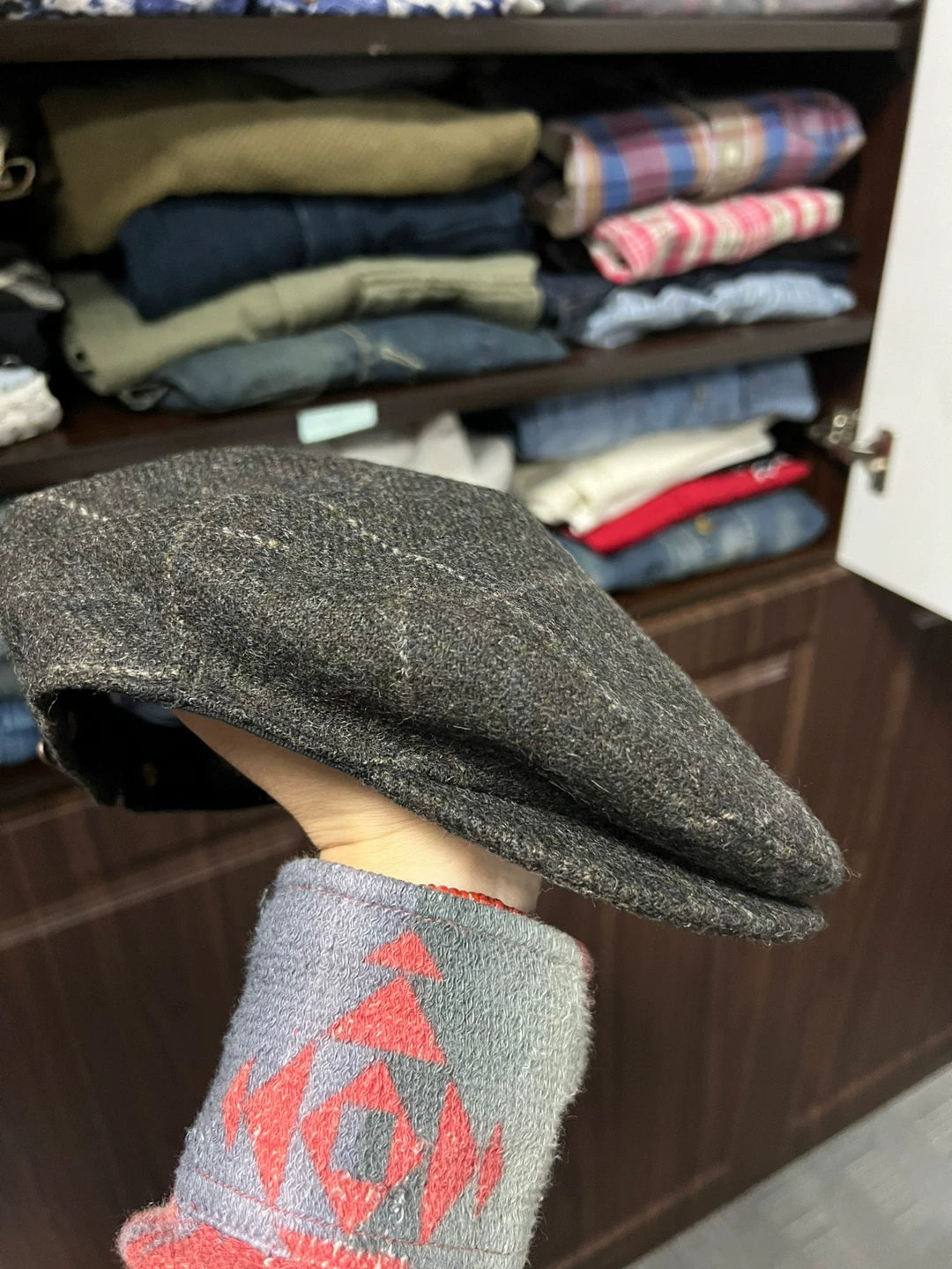 gray newsboy cap with plaid pattern