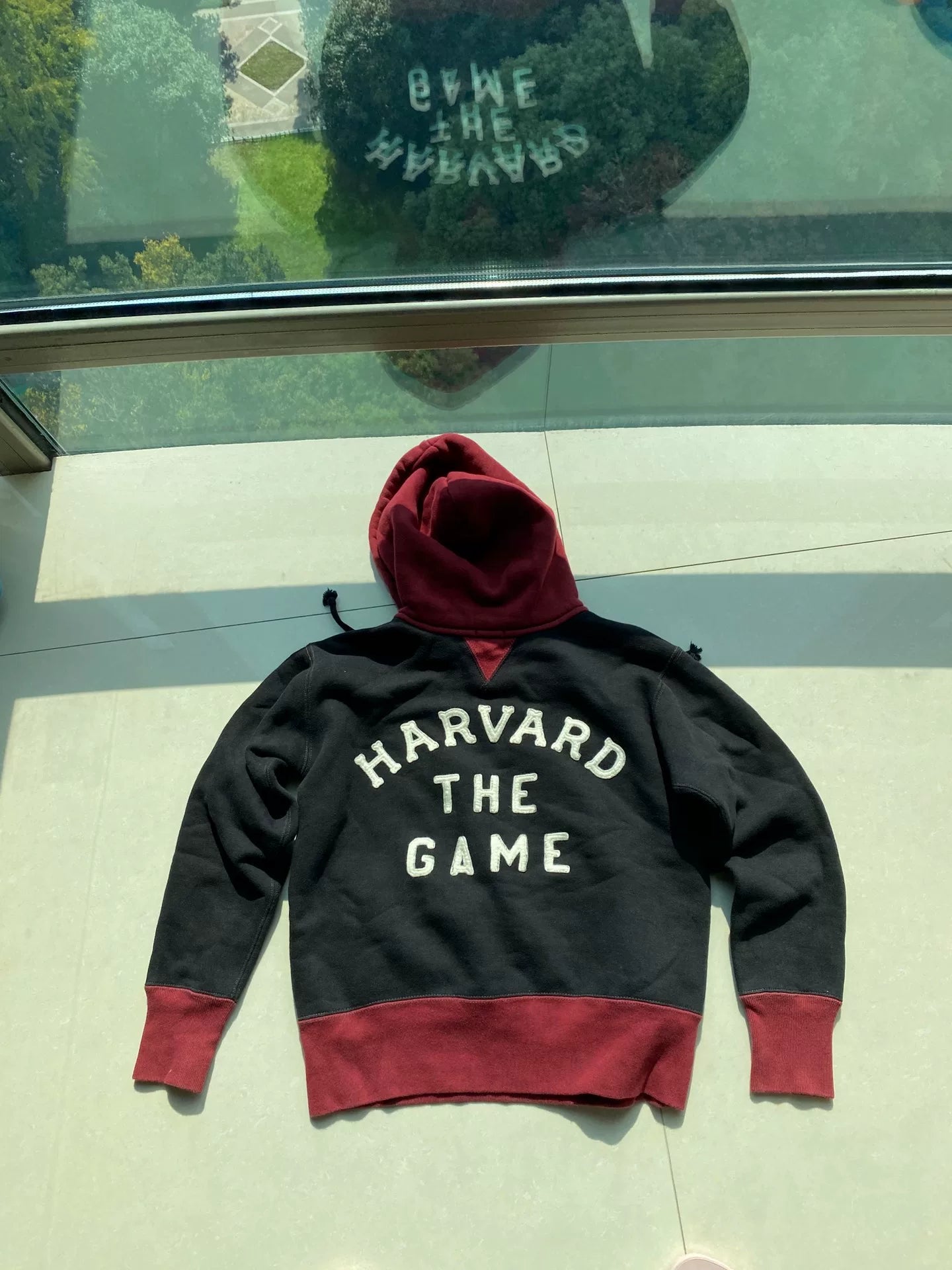 red and black hooded sweatshirt with pockets