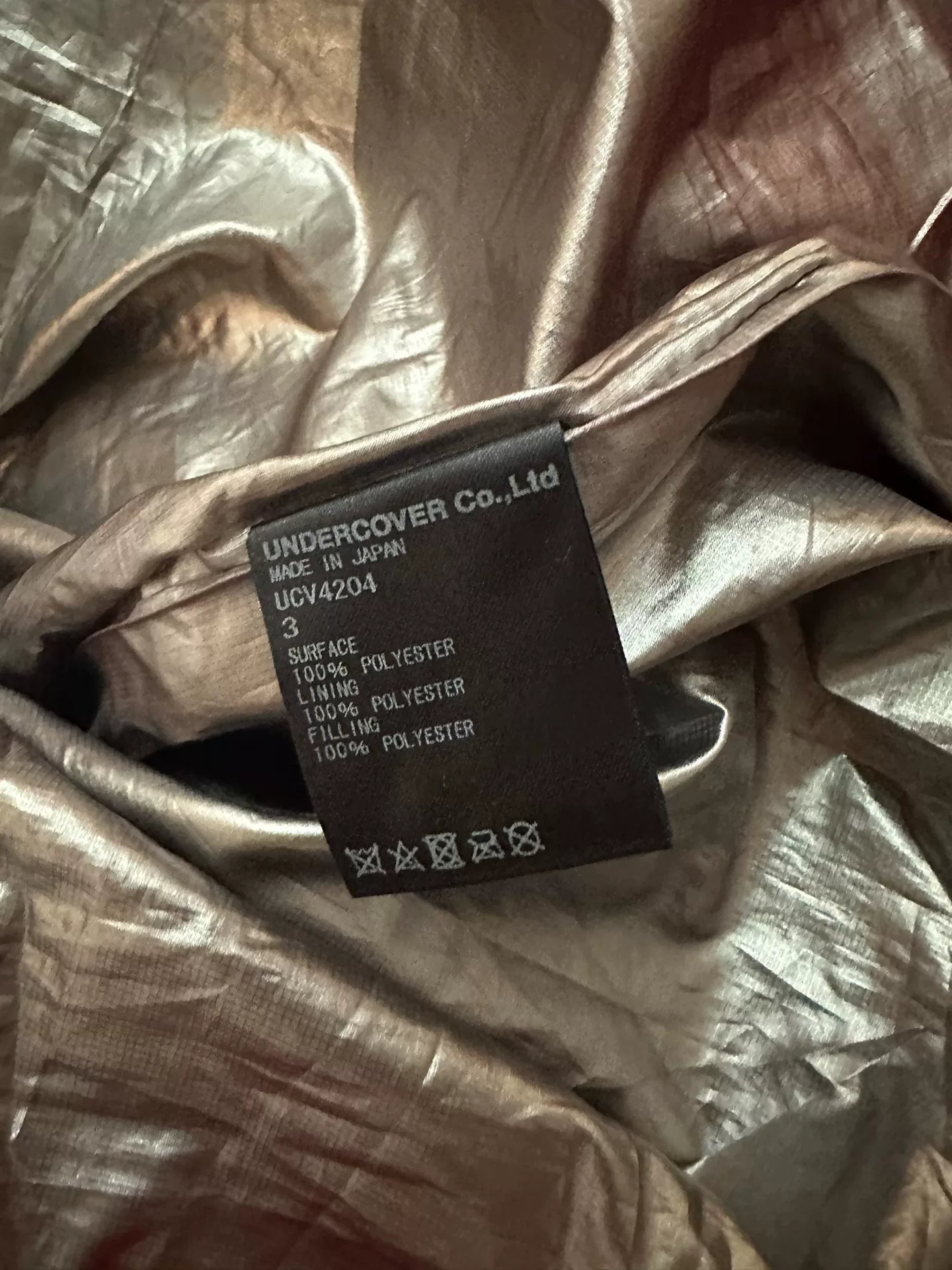 red astronaut hooded puffer jacket