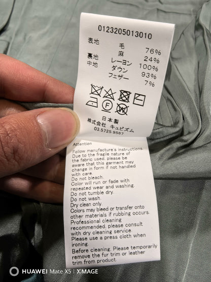 visvim ulmer down jacket in green hue