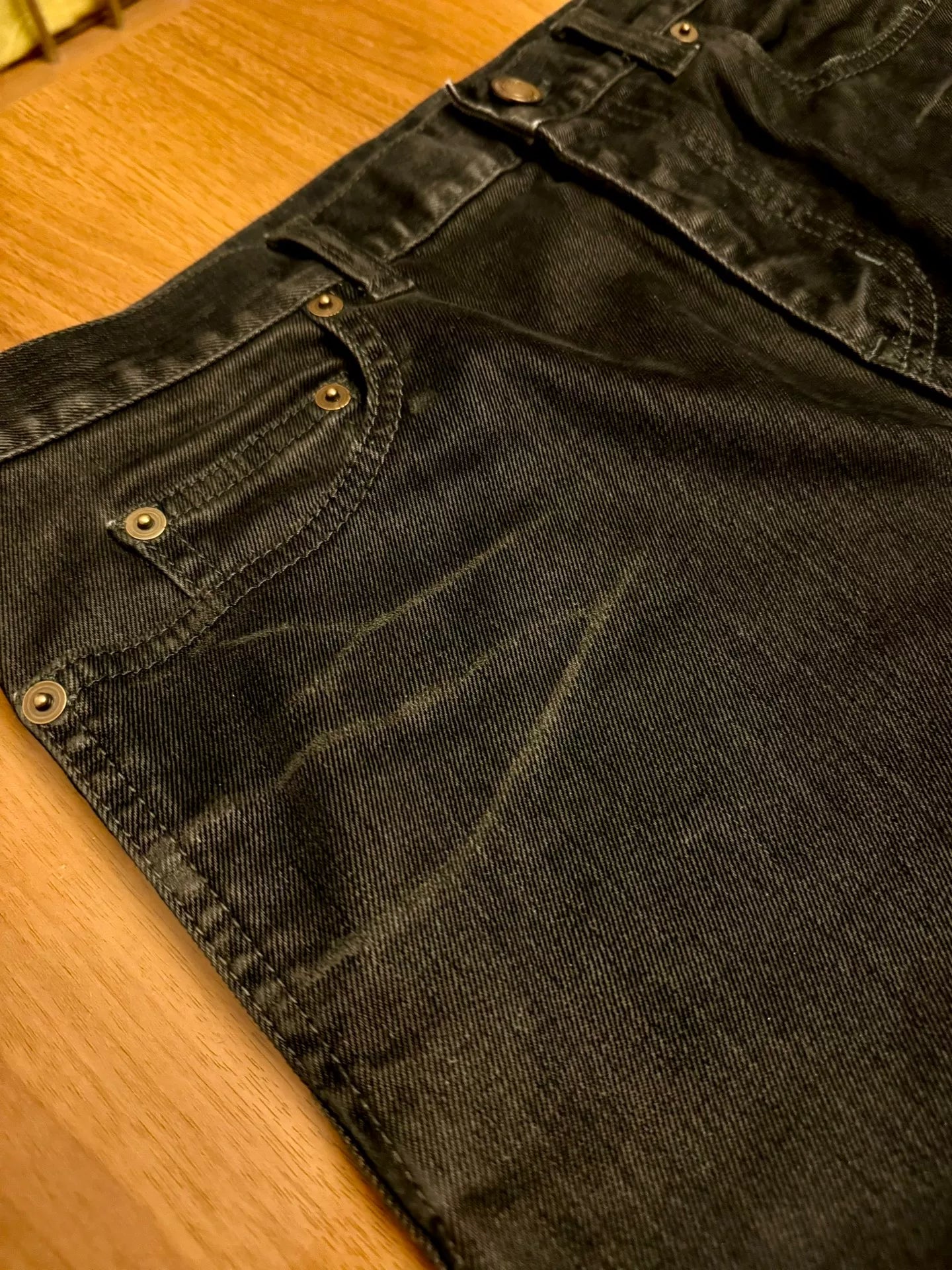 saint laurent black straight-leg waxed jeans