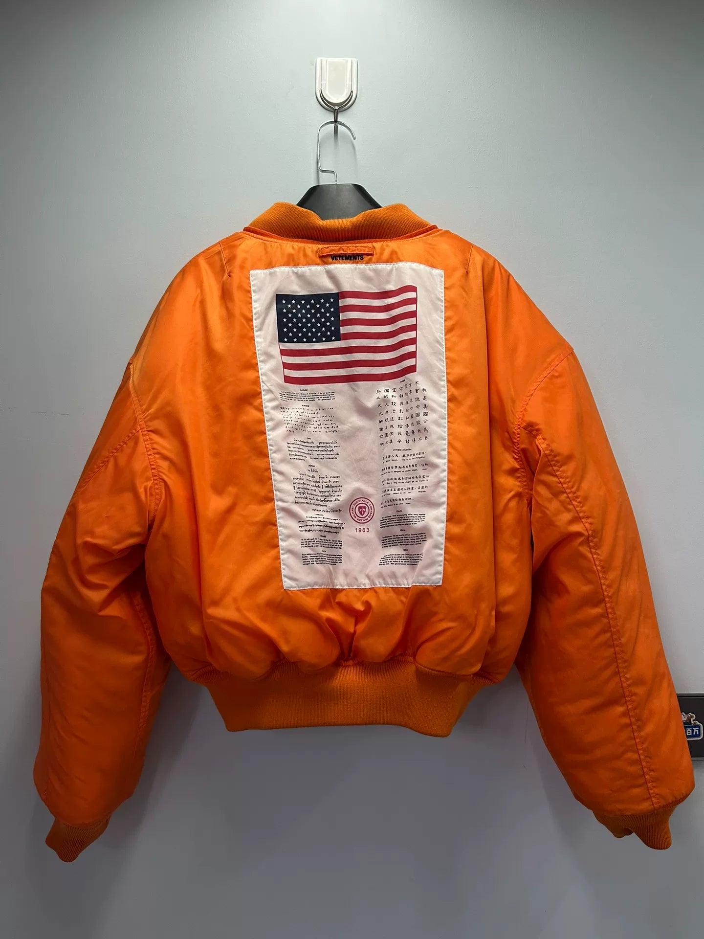 reversible black and orange bomber jacket