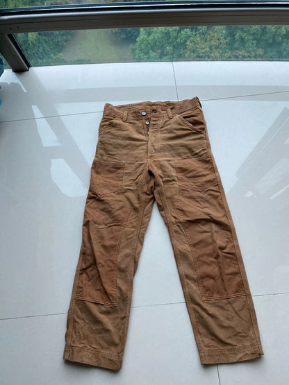 brown patched work pants derrickman