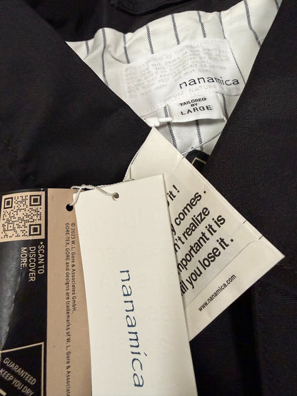 black gore-tex coach jacket by nanamica