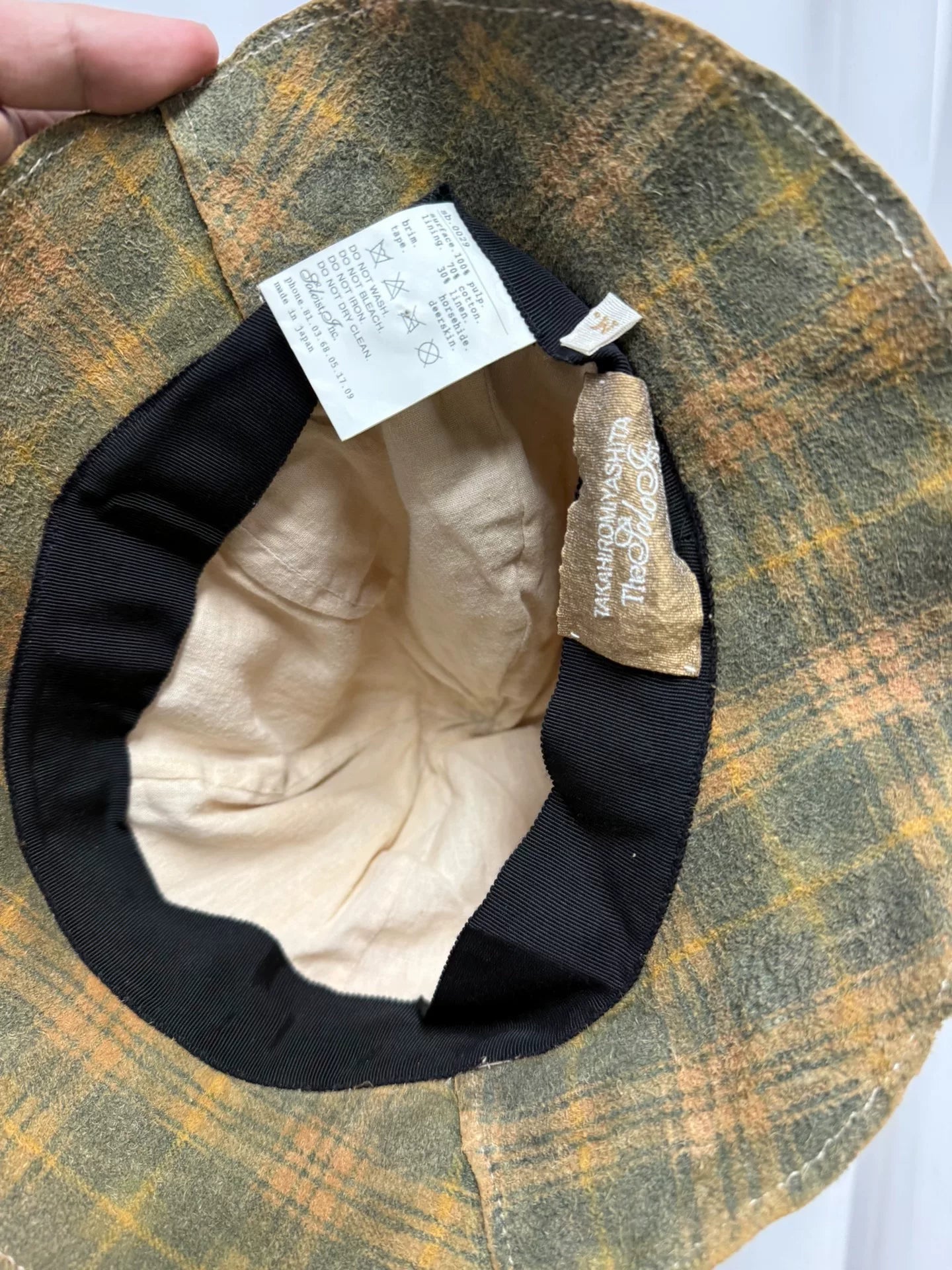 soloist feathered fisherman's hat