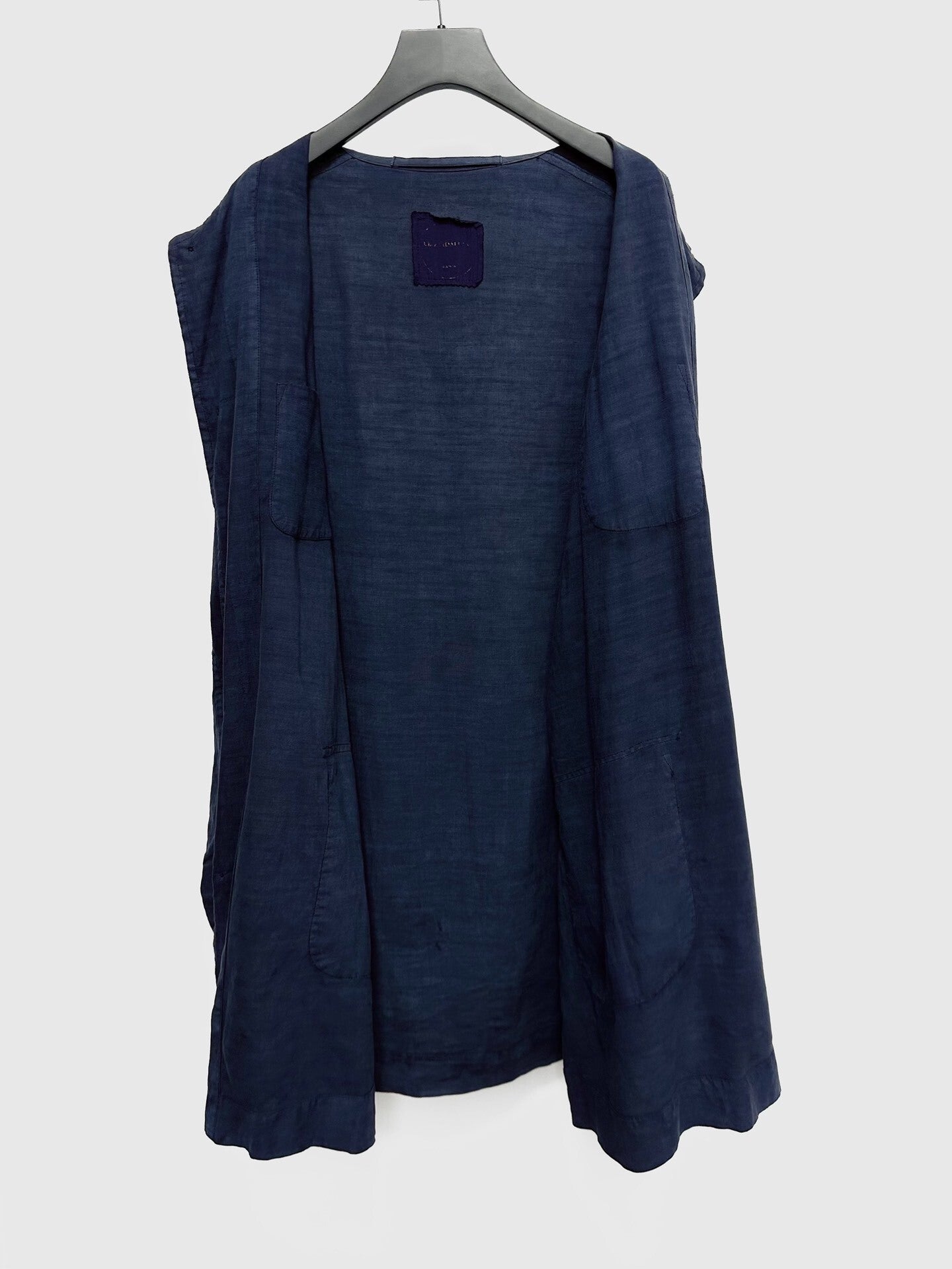 blue dyed linen coat by VIDALENC