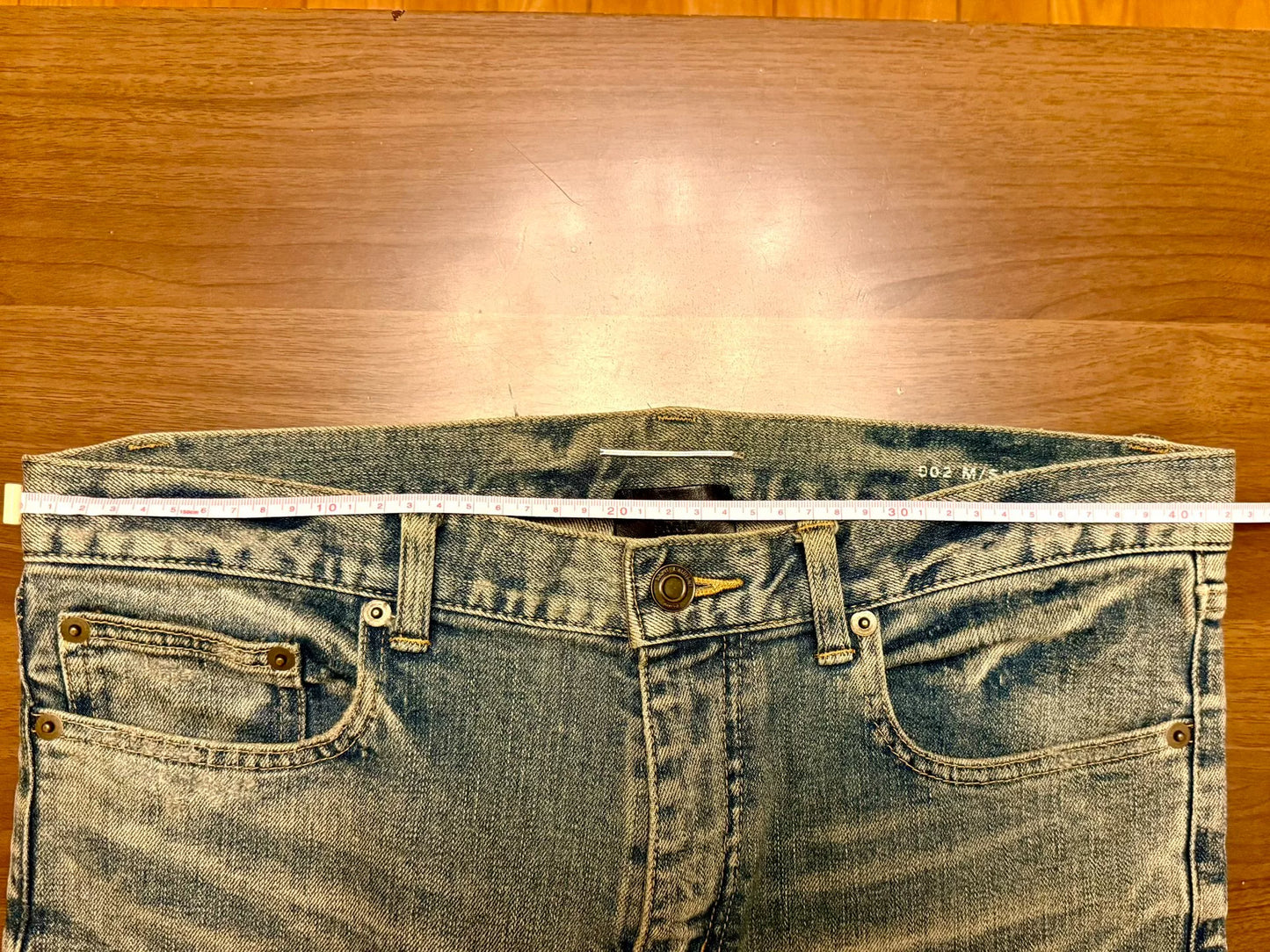 saint laurent distressed denim jeans A+