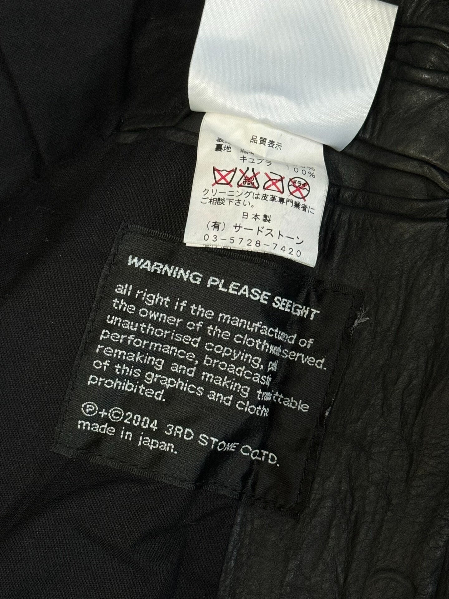 avant-garde crumpled leather suit jacket