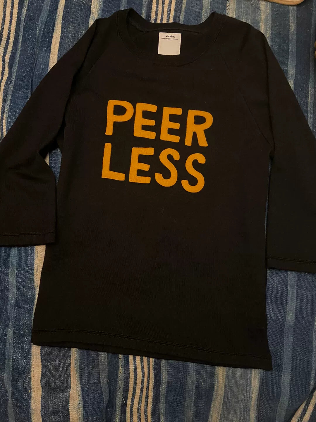 peerless black long sleeve knit top