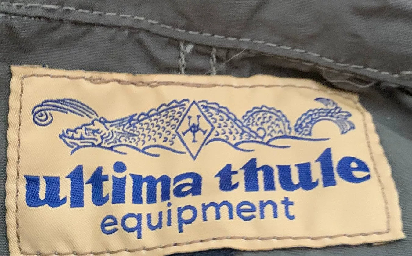 tactical raincoat for outdoor adventure in green