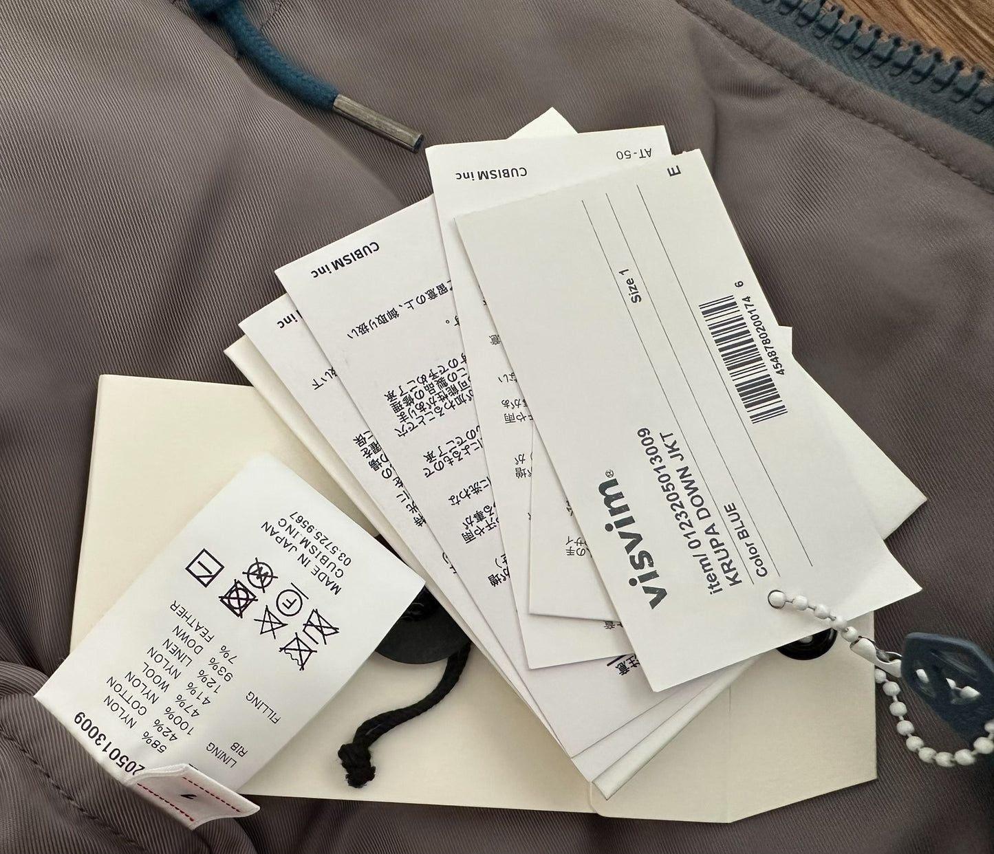 visvim krupa down jacket in blue