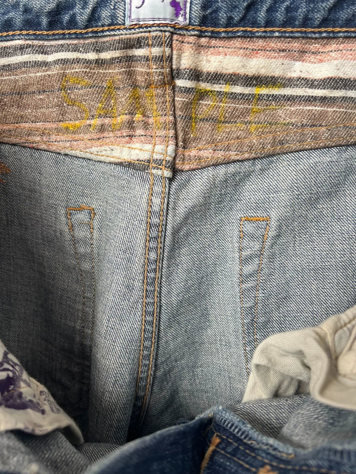 Light Blue Distressed Denim Jeans