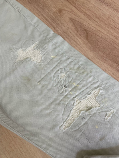 ivory corduroy pants with paint splatter