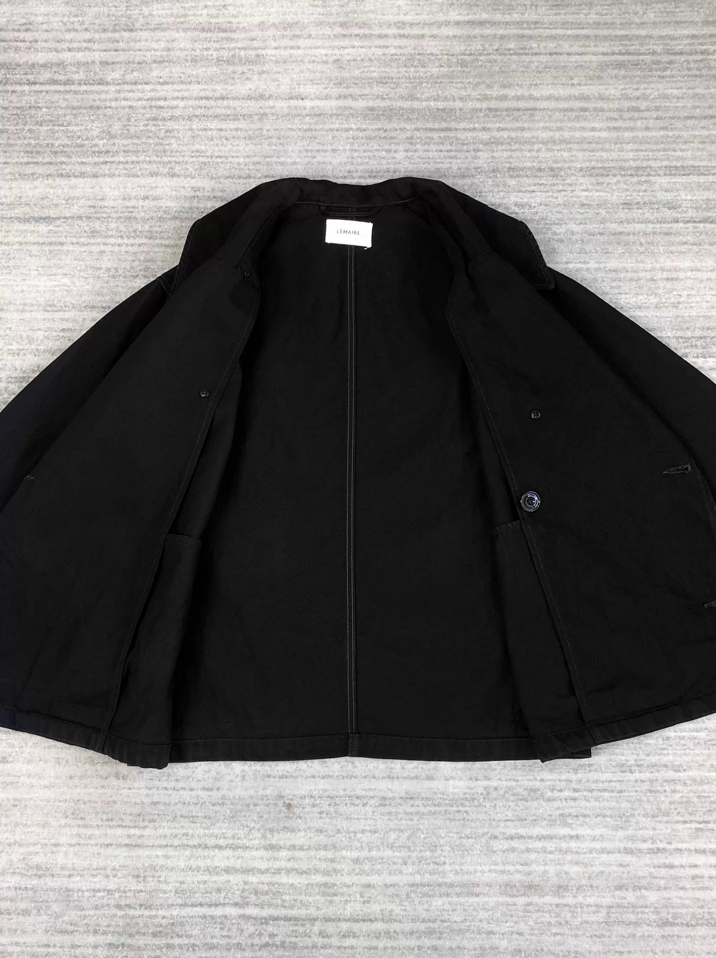 black double-breasted jacket with collar