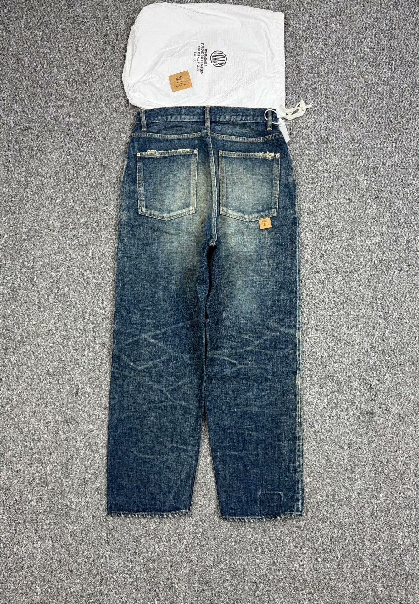 madness distressed denim pants for casual styling