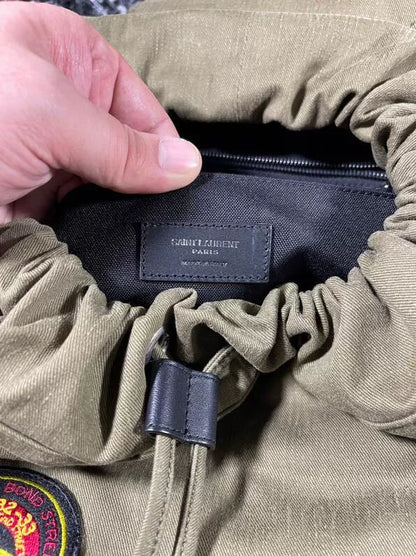 military green patch backpack from saint laurent